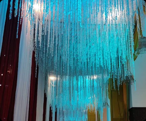 Foil and fabric stage decor in the main hall at Sri Sai Convention Hall, Jayanagar 9th Block
