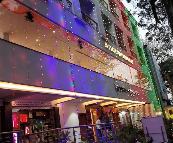 The entrance of Sri Sai Convention Hall lit in colour for a celebration, Jayanagar, Bengaluru